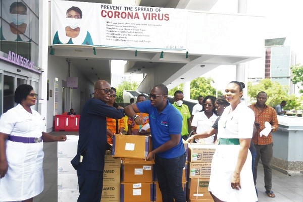 Mr Solomon Ohene Owusu (right) presenting the medical supplies to Dr Emmanuel Srofenyoh in Accra.  Picture: Emmanuel Quaye