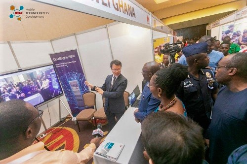 Mr ZhenTao explaining some features of the CloudLink solution to Dr Bawumia (arrowed)