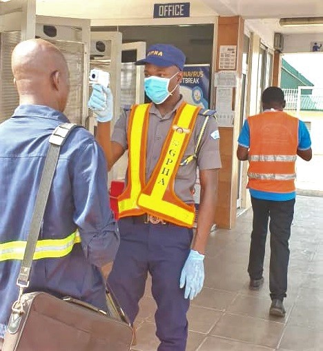 A Customs Officer being screened by a security officer stationed at the Golden Jubilee Terminal at the Tema Port