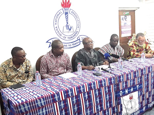 Mr Thomas T. Musah (middle), flanked by Mr Jacob Anaba (2nd left), the Vice-President of NAGRAT; Mr Enoch Asante Abrokwah (2nd right), the Vice-President of CCT-GH; Mr Samuel Dadzie (left), the General Secretary, NAGRAT, and Mr Peter K. Lumor (right), the Chairman of TEWU at the press conference