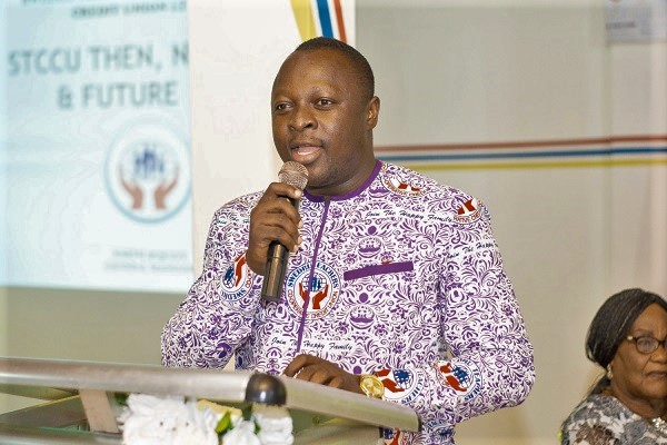 Mr Joseph Acquaye (inset), the General Manager, addressing the members