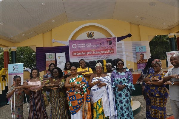 Ms Freda Prempeh (right) with some queen mothers and women’s rights activists after the programme