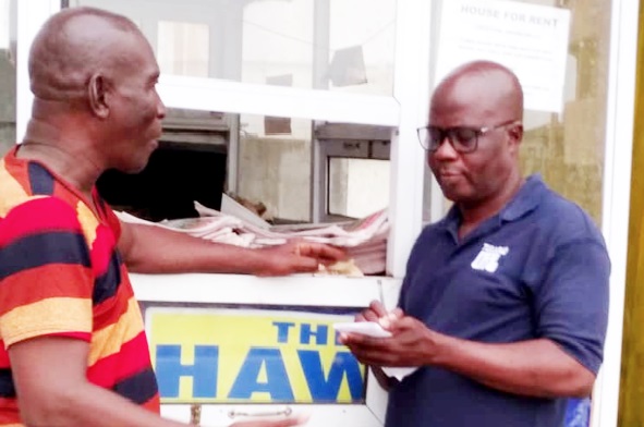 Mr Timothy Gobah, a Staff Writer of the Daily Graphic (right), interviewing Mr Binney in Cape Coast