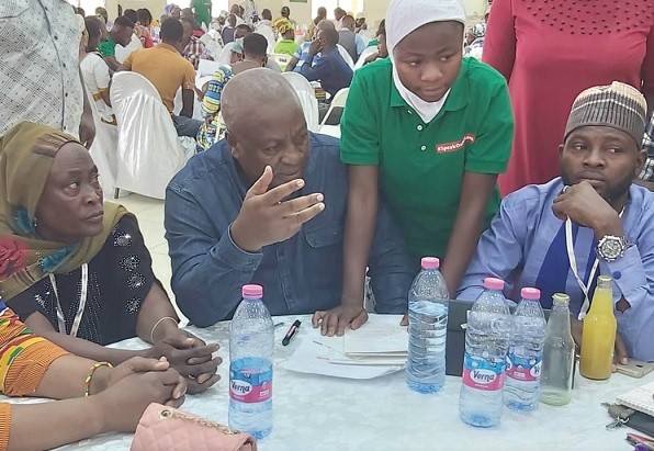 Former President, John Dramani Mahama interacting with some of the participants in the Speak-out-session held at Bolgatanga