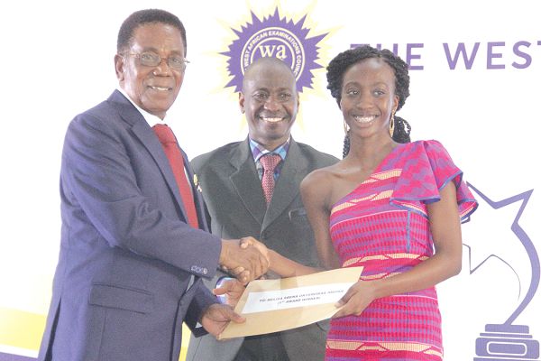  Prof. Kwesi Yankah (left) presenting the 2019 WAEC Overall Best Student in Ghana award to Ms Melisa Abena Okyerewaa Amoah (right).  Picture: EDNA SALVO-KOTEY
