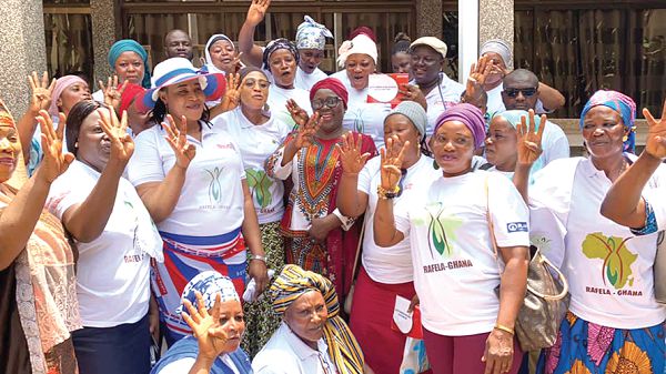  Hajia Alima Mahama (arrowed), Local Government and Rural Development Minister, with some assembly members