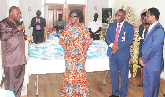  Mr Alexander Abban (left), Deputy Minister of Health, making some remarks after the presentation of the items. Also in the photograph are Rev Veronica Darko (2nd left), Chairperson, 14th Governing Council, Nursing and Midwifery Council, and Apostle Eric Nyamekye (right), Chairman, Church of Pentecost. Picture: Maxwell Ocloo