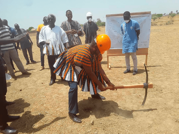 Mr Joseph Dindiok Kpemka, the MP for Tempane and Deputy Attorney General cutting the sod