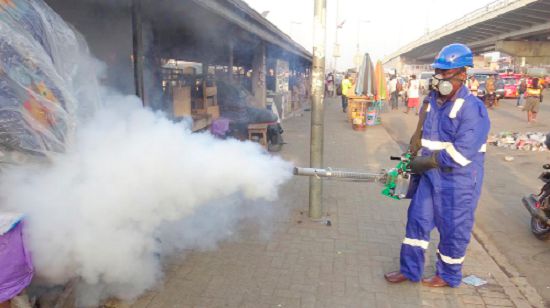The disinfection exercise at the Kasoa old market