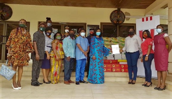 Mrs Barbara Oteng-Gyasi (arrowed), Minister for Tourism, Arts and Culture, with some members of the Creative Arts (left) and officials from KFC and Vida e caffé 