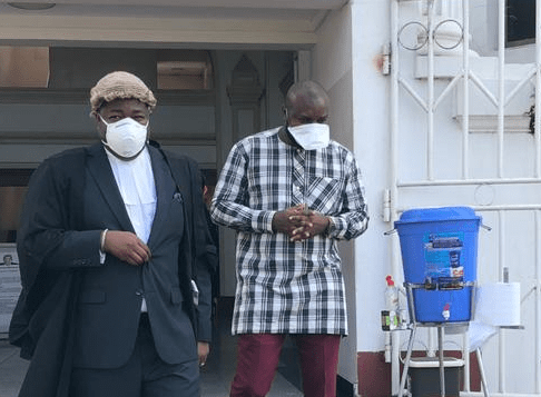 Yaw Brogya Genfi(right) leaving the Supreme Court with his lawyer