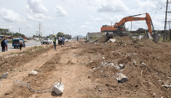 Clearing has begun for road extension works to start on the Pokuase-Nsawam road.