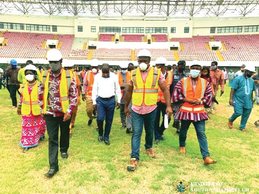 Minister of Sports, Isaac Asiamah, leads an entourage to inspect Essipon Stadium