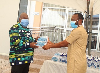  Mr Shaib (right) presenting the items to Mr Ishmael Ashitey Photo Seth Osabukle