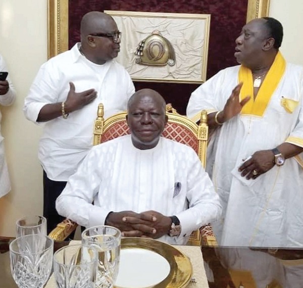 The Asantehene, Otumfuo Osei Tutu II  (seated) in the company of some well wishers on his 70th birthday