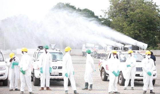 Workers of Zoomlion demonstrating their readiness for the fumigation exercise