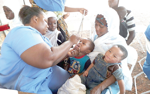 A child receiving polio vaccine