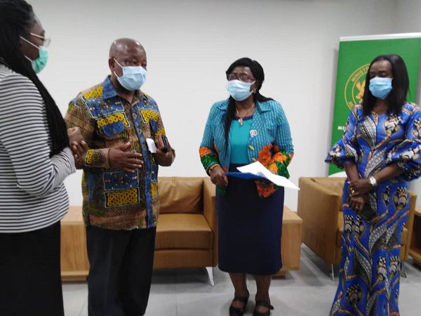 Mr Manu (2nd left) interacting with Dr Kimambo (left) and Mrs Darko (right) after the event. With them is Dr. Martha Gyansah-Lutterodt, (3rd left) Director, Technical Coordination, Ministry of Health after the presentation.