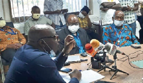 Mr Agyeman-Budu (left),  MD-ECG, addressing the press