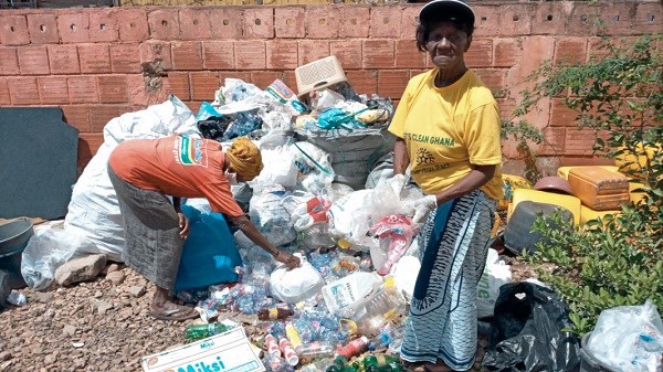  Ms Esther Vanderpuiye (right) with some of the plastic waste  