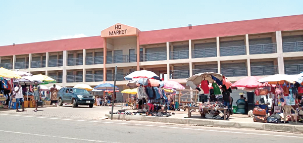 Vendors displaying their wares at the forecourt of the Ho Central Market