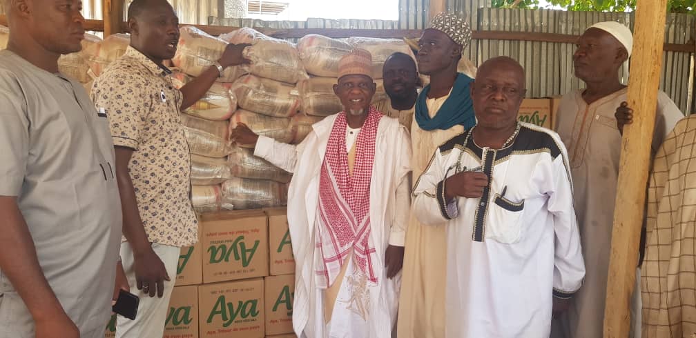 Alhaji Bashiru Abdul-Wahab (second left) donating the items on behalf of the NAFCO CEO to Muslim communities in Bawku.