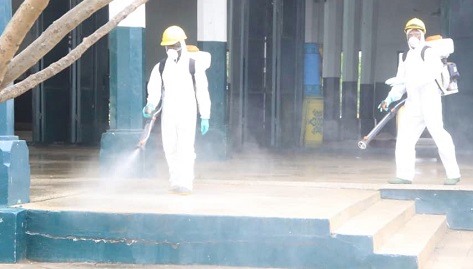Some staff members of Zoomlion Ghana Limited carrying out the disinfection exercise