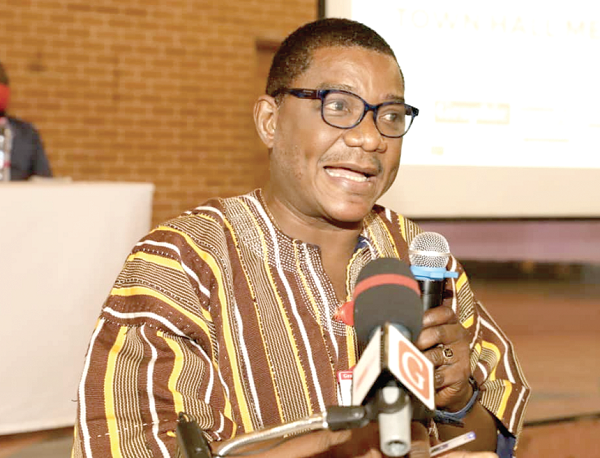 Mr Kobby Asmah  addressing the pariticipants