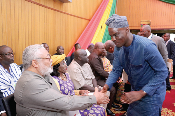 FLASHBACK: Mr Iddrisu in a handshake with former President Rawlings during an event in Accra