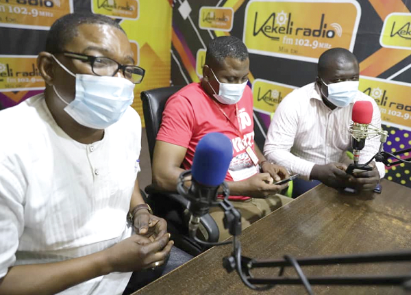 Mr Kobby Asmah (left), the Editor of the Daily Graphic; Mr Franklin Sowa (middle), Director, Sales and Marketing of GCGL, and Mr Ofei Aferi, CEO of Spring Consult, at Kekeli Radio studio in Ho