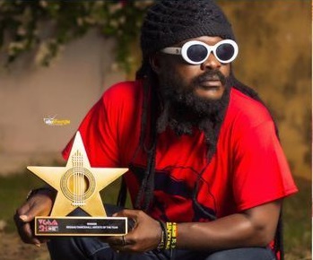 Reggae/Dancehall musician Ras Kuuku says he is not done showing off his VGMA trophy