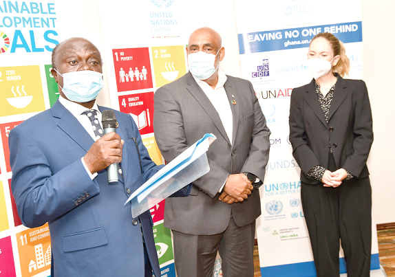  Prof. George Gyan-Baffour (left), the Minister of Planning, Mr Charles Abani (middle), the UN Residential Representative to Ghana, and Ms Drothee Dinkelaker (right), the Head of Cooperation, Germany, jointly launching the SDG Financial Component One. Picture: EBOW HANSON