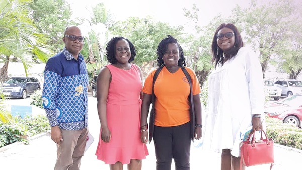 Mr Harold Esseku (left), Vice-President of the Ghana Institution of Engineering, Dr Enyonam Kpekpena  (2nd left) and other WINE members at the prgramme