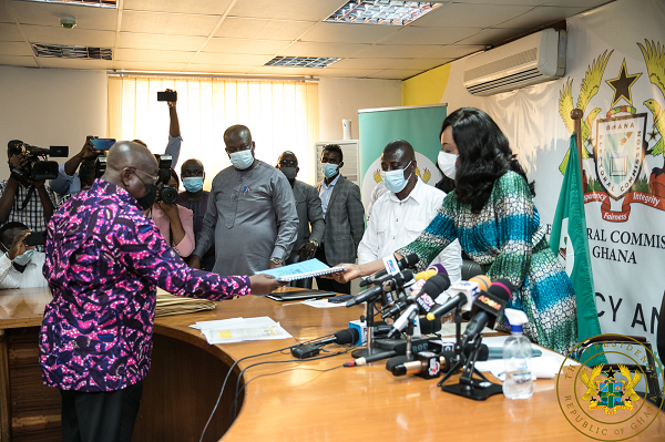 President Akufo-Addo presenting his nomination forms to Mrs Jean Mensa (left), the Chairperson of the Electoral Commission