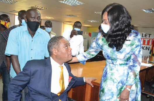 Mrs. Jean Mensa interacting with Mr. Ivor Greenstreet of the CPP after receiving his forms. Pictures: EBOW HANSON