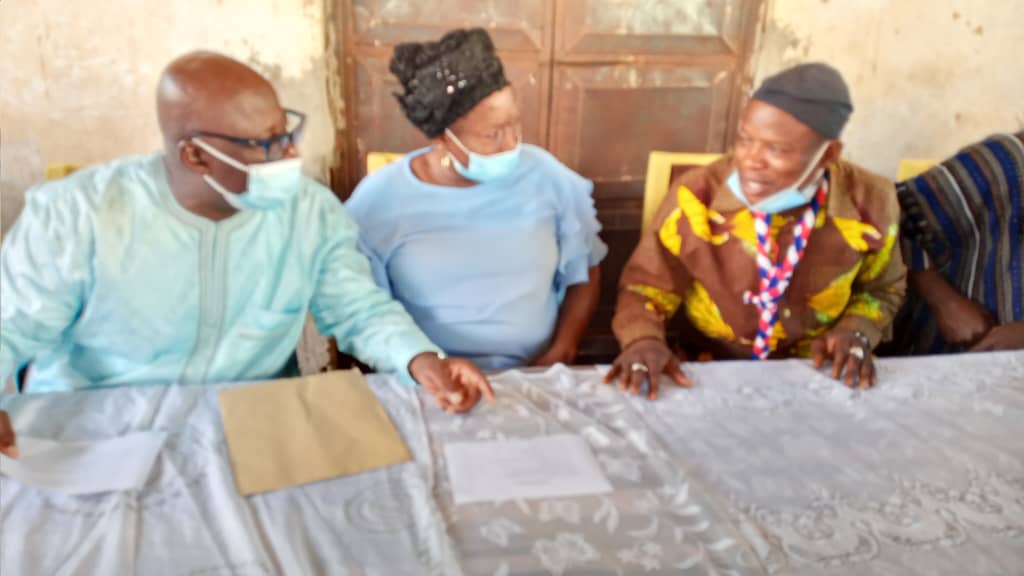 Rita Talata Asobayire speaking and flanked by Prince Imoro Andani, former Northern Regional Minister left and Salifu Saeed,  current Northern Regional Minister right. 