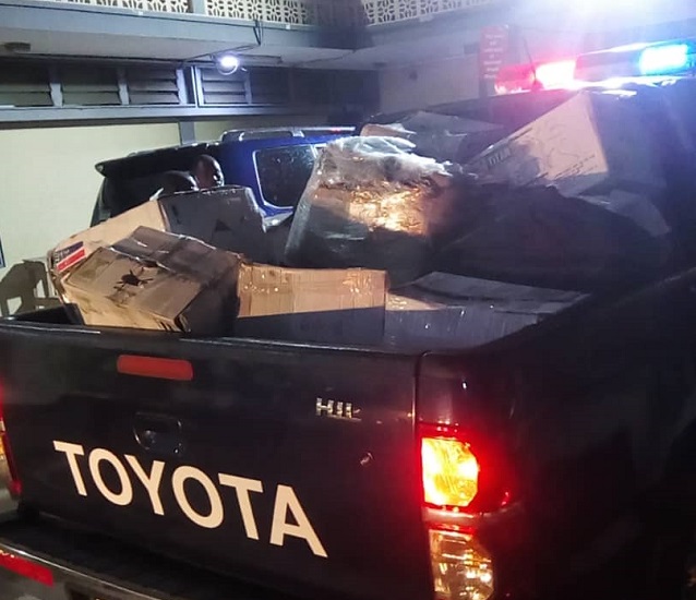 The seized pistols and ammunition being transported 