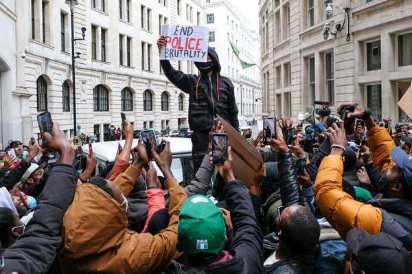 Nigerian star Wizkid addressed demonstrators in London on Sunday