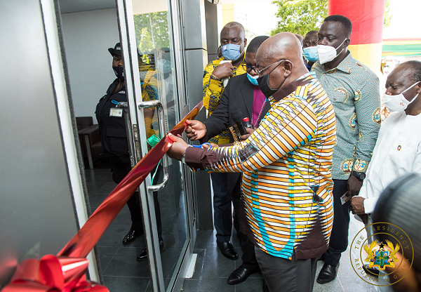  President Akufo-Addo unveiling a plaque to inaugurate the building. With him is Dr Anthony Yaw Baah (right), the Secretary General of the TUC. Picture: SAMUEL TEI ADANO