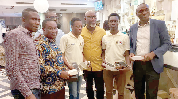 From left: Messrs Franklin Anane Gyimah, Richard Mensah, Richmond Kyei Marfo, David Amoh-Osae Jnr, Jephthah Kwame Mensah, Osei Kwame Hiamang (tutor) and Kwaku Sarfo Manu (behind) after the dinner 