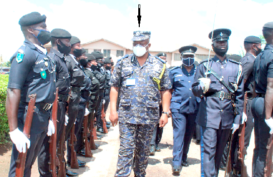 Mr. James Oppong-Boanuh (arrowed) inspecting a guard of honour mounted for him during the visit