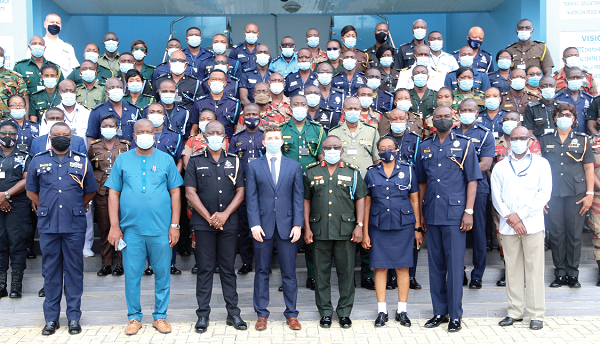 COP Dr George Akuffo Dampare (3rd left), Director General, Administration of the Ghana Police Service, with Mr Moritz Fischer (4th left), Representative of German Ambassador to Ghana, and Major General Francis Ofori-Atta (4th right), Commandant of KAIPTC,  and some other officers at the opening ceremony of electoral violence and security course in Accra. Picture: ESTHER ADJEI