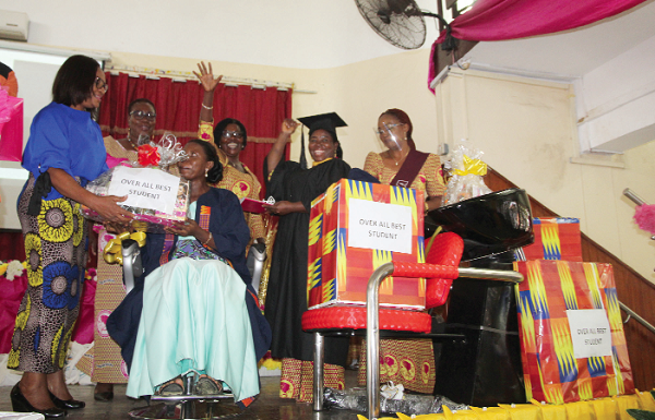 Mrs Christiana Okine (left), former President of GHABA, presenting the Overall Best Student award to Mrs Alice Kpobi. Those with them are Ms Bernice Asantewaa Asantey (2nd right), President of GHABA and Ms Tina Offei-Yirenkyi (3rd right), former President of GHABA. Picture: ESTHER ADJEI