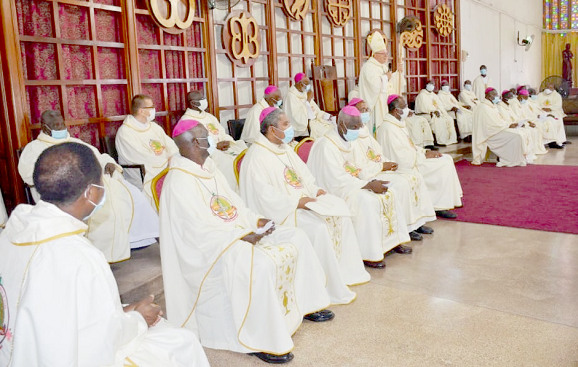   Most Rev. Henryk M. Jagodzinski (arrowed) speaking during the Mass