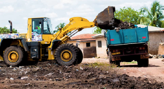 Refuse being cleared from the dumpsite at Droboso