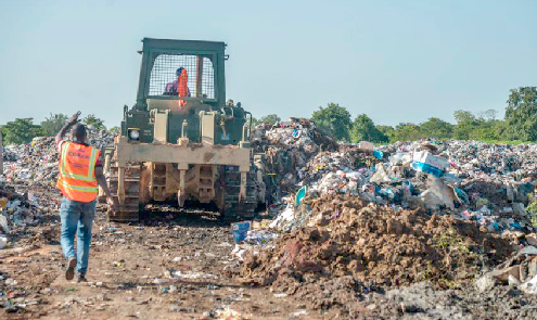 A dumpsite in Bolga being cleared.