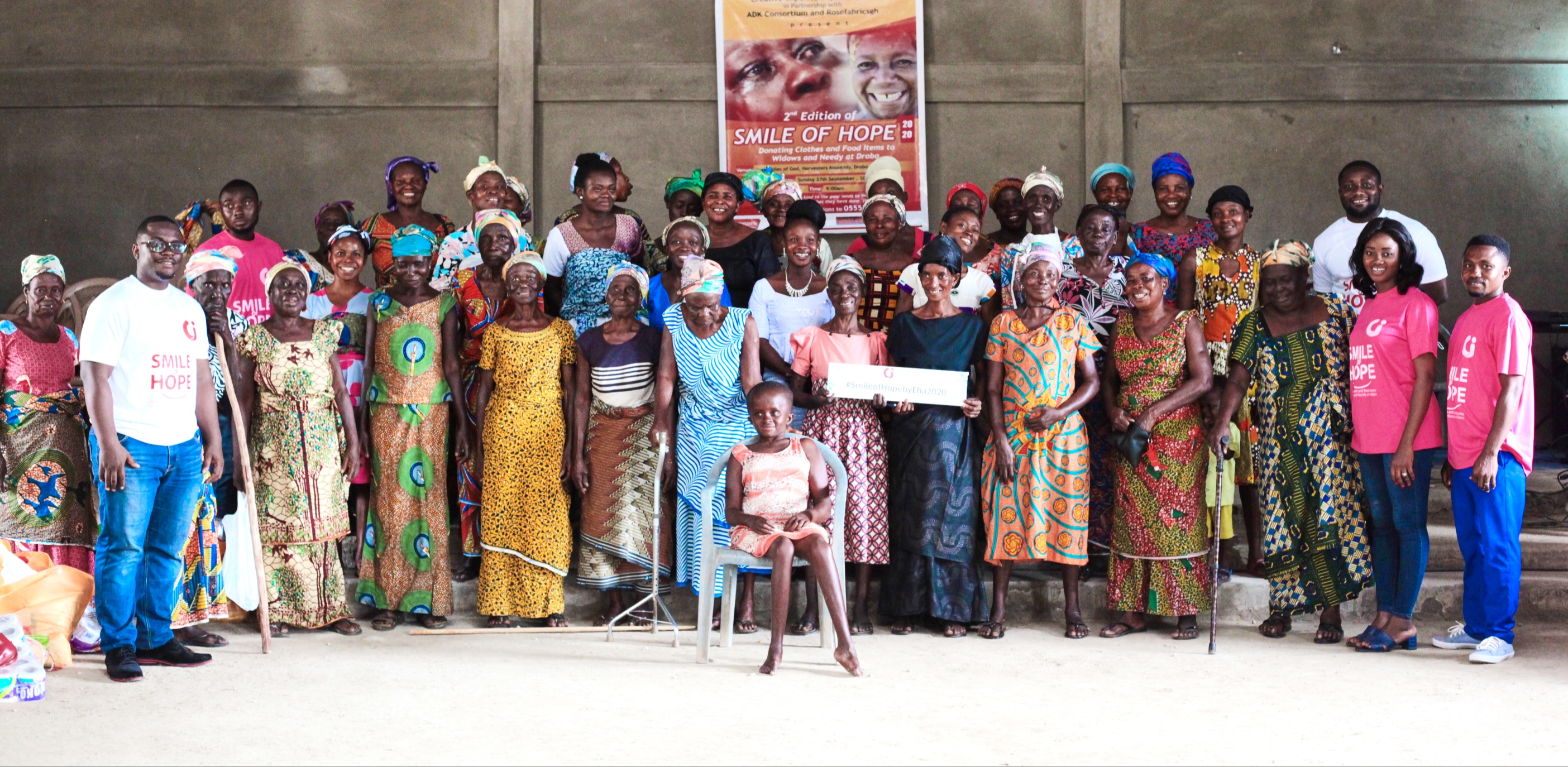 Ms Efia Kyeremaa (2nd right), CEO, Creative Impulse with some members of the Creative Impulse team and some beneficiaries after the presentation.