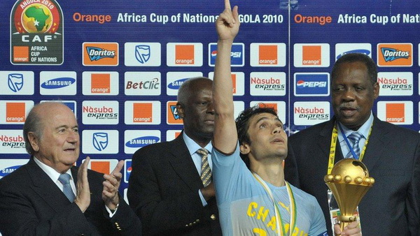 Egypt captain Ahmed Hassan holds the Nations Cup after winning the 2010 final