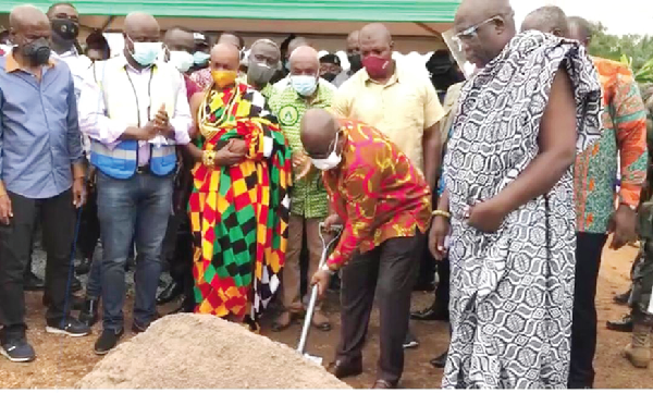 President Nana Akufo-Addo  cutting the sod for the construction of the Ho bypass and UHAS internal roads