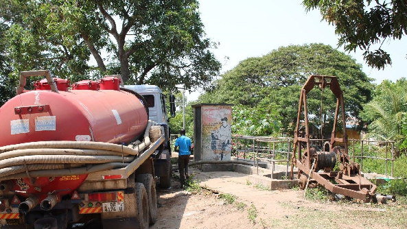 A truck dumping waste into the receptive facility at the Central Processing station at Community Five. PIX DELLA RUSSEL OCLOO